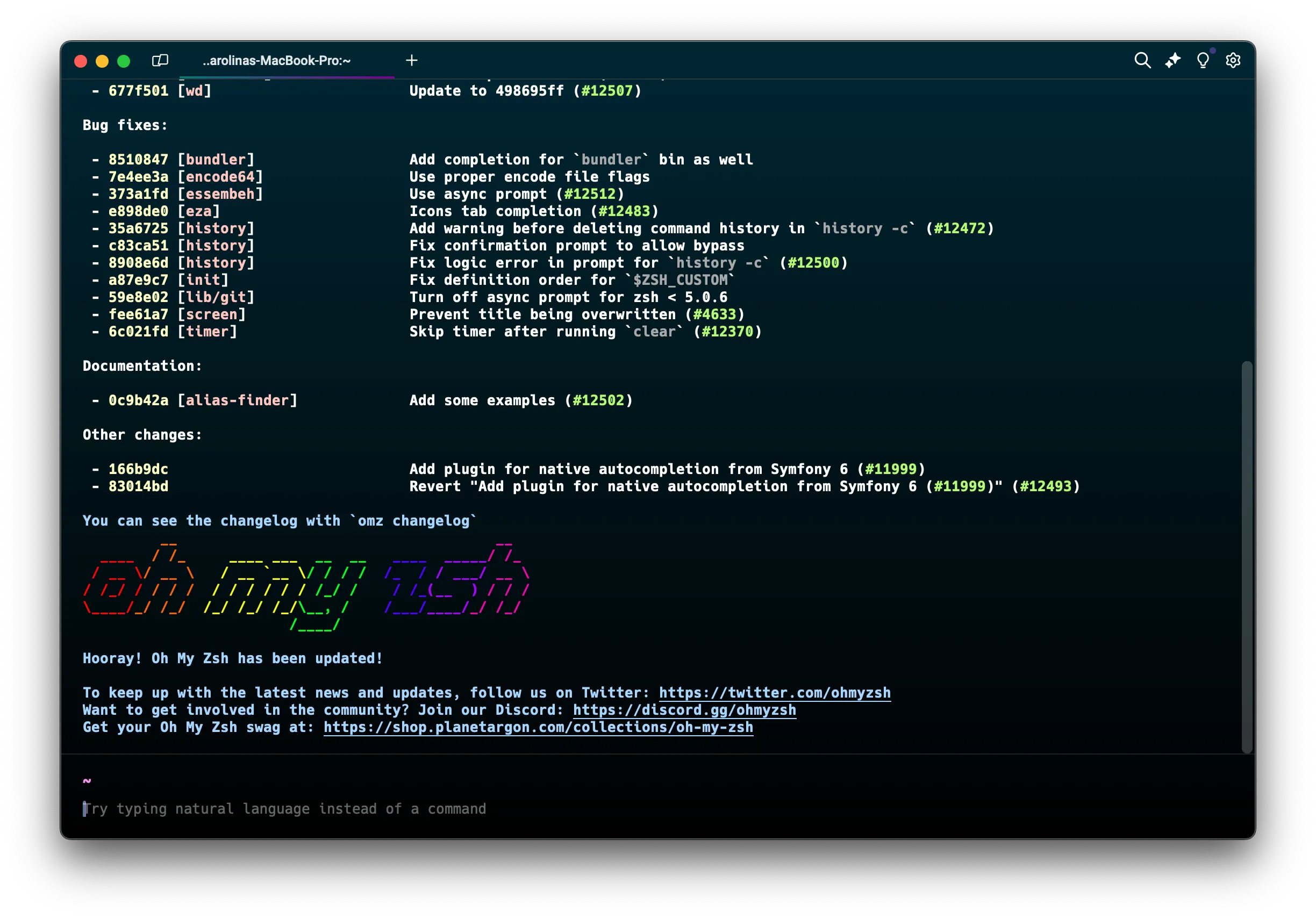 A screenshot of warp, the theme is dark blue, and you can see some ascii art of oh my zsh.